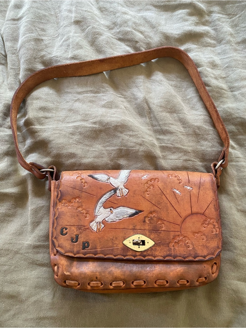 Handcrafted Brown Leather Bag with Bird Embossing